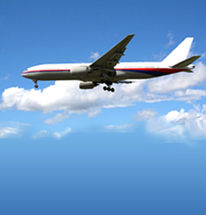 Airplane flying to airport